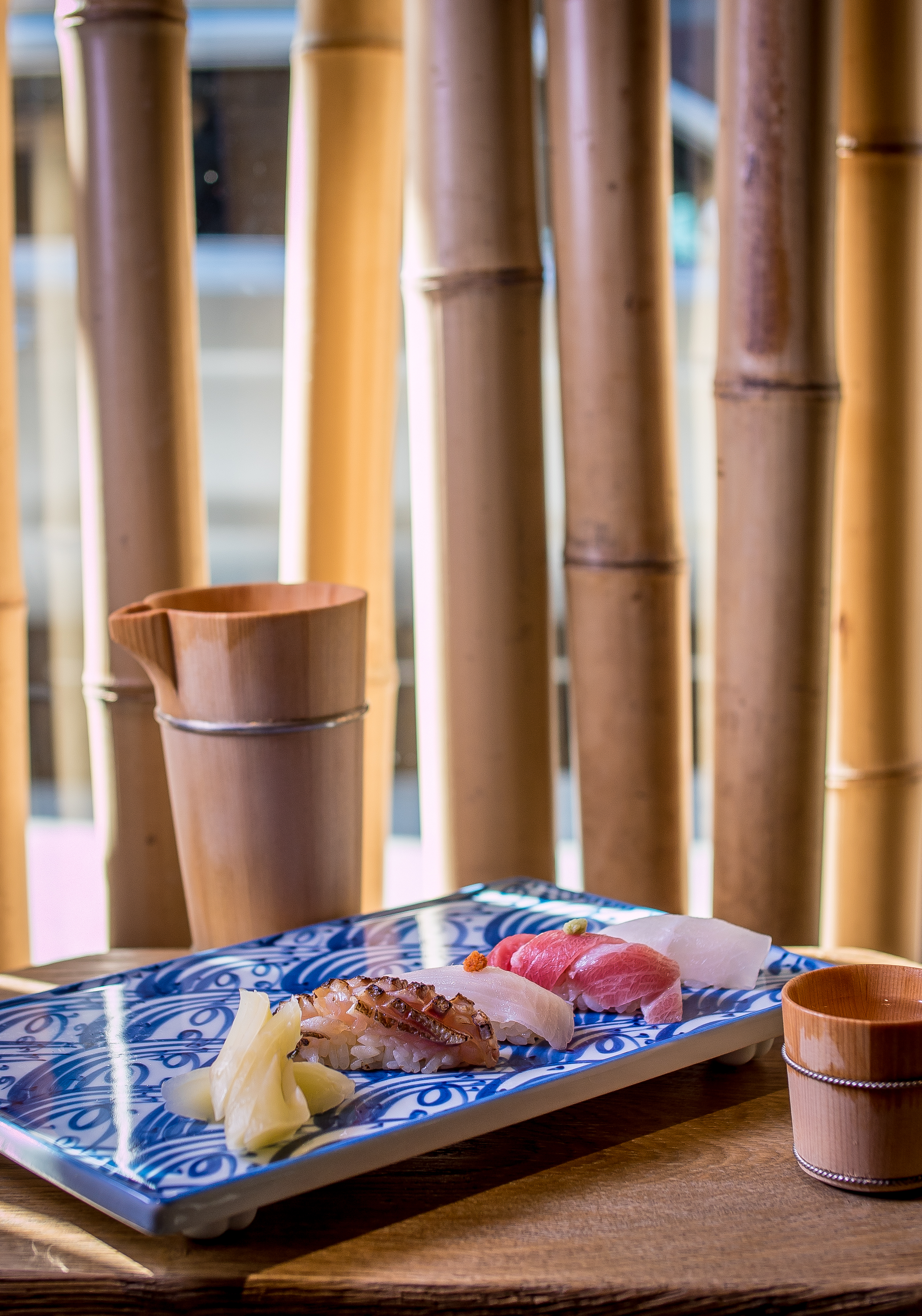 Assorted sushi with Sashimono wooden collection at Omakase in San Francisco. Photo by John Storey